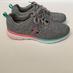 SKETCHERS Lite-Weight Air-Cooled Memory Foam Trainers.